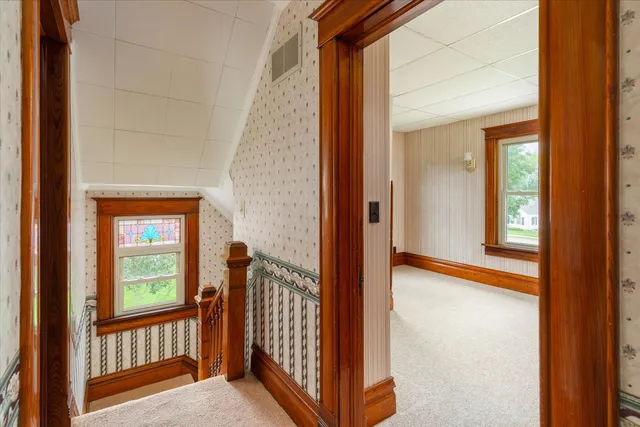 a view of a room with a large window