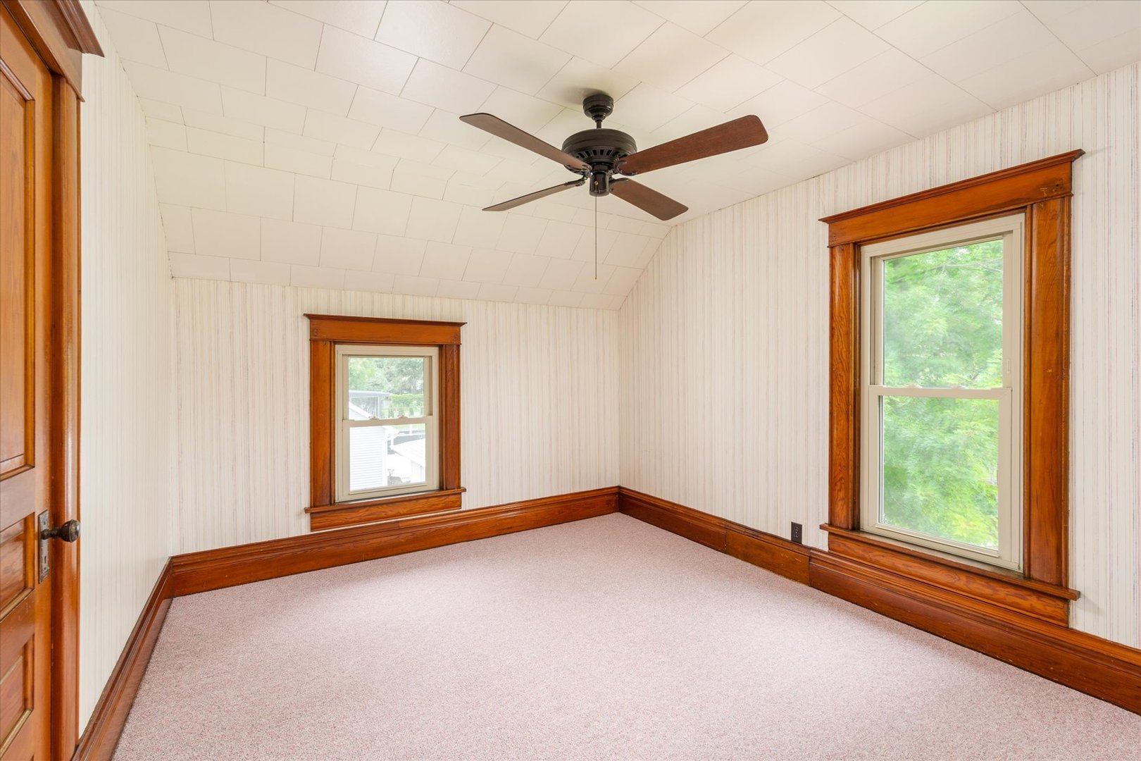443 East Peru Street Princeton, IL 61356 - Photo 24 of 44 a view of a room with a window and a ceiling fan
