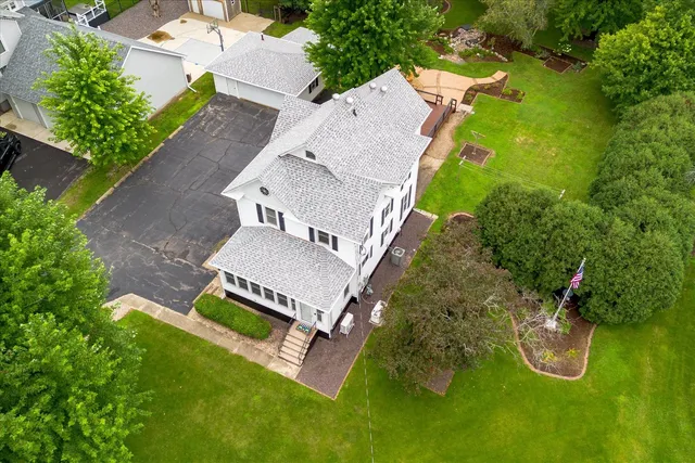 an aerial view of a house with a garden