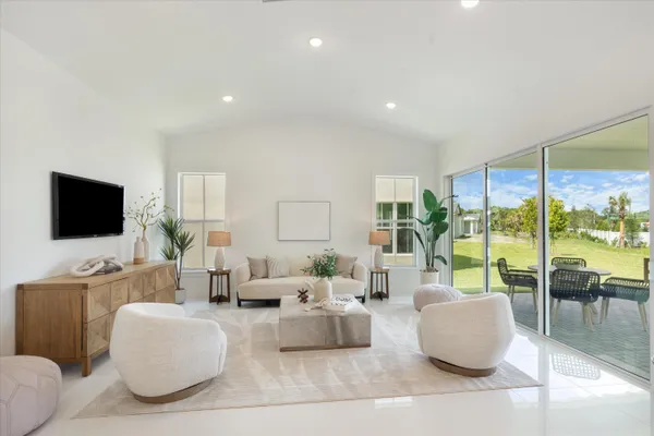 a living room with furniture and a table
