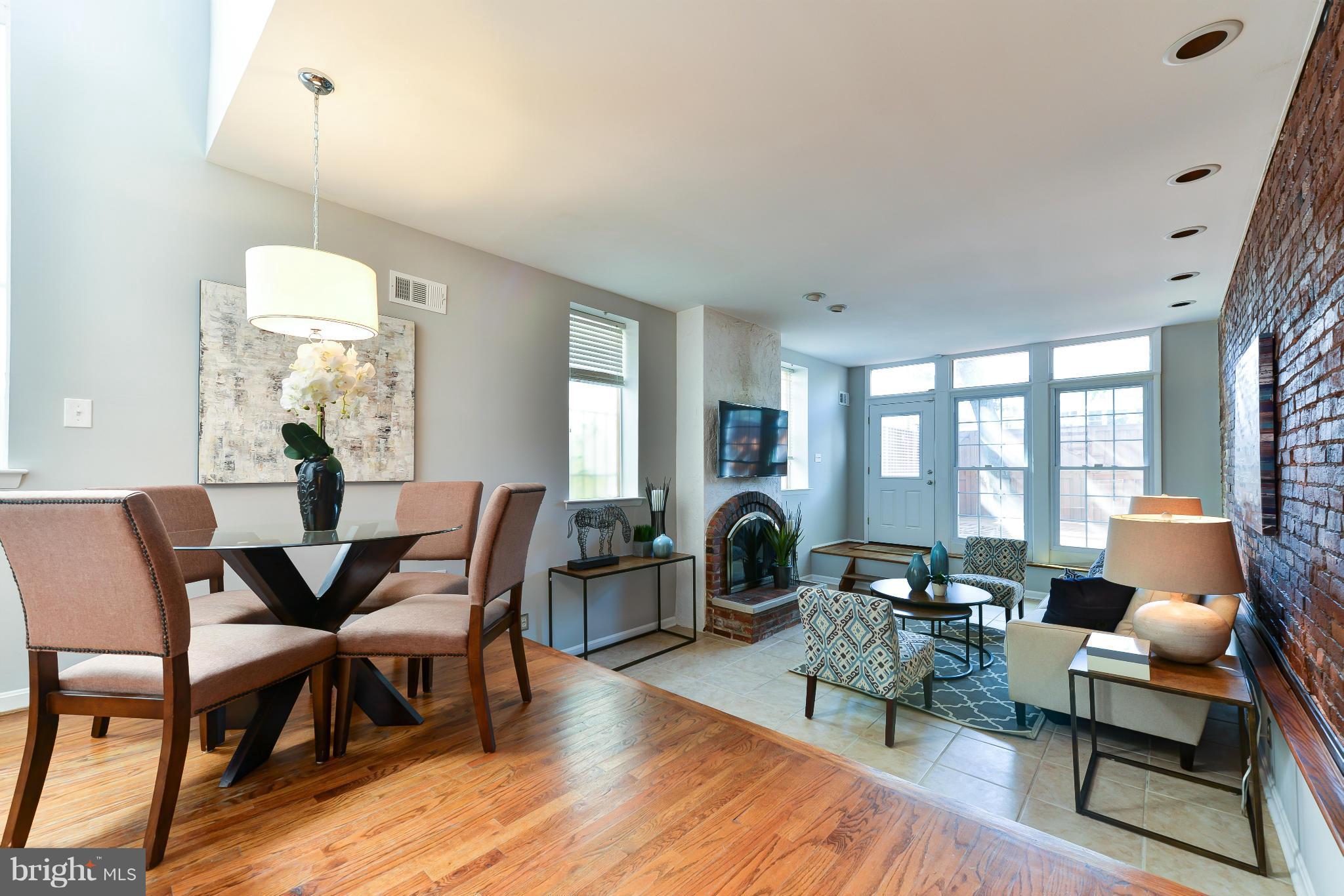 1243 Linden Place Northeast Washington, DC 20002 - Photo 2 of 30 a living room with furniture and a large window