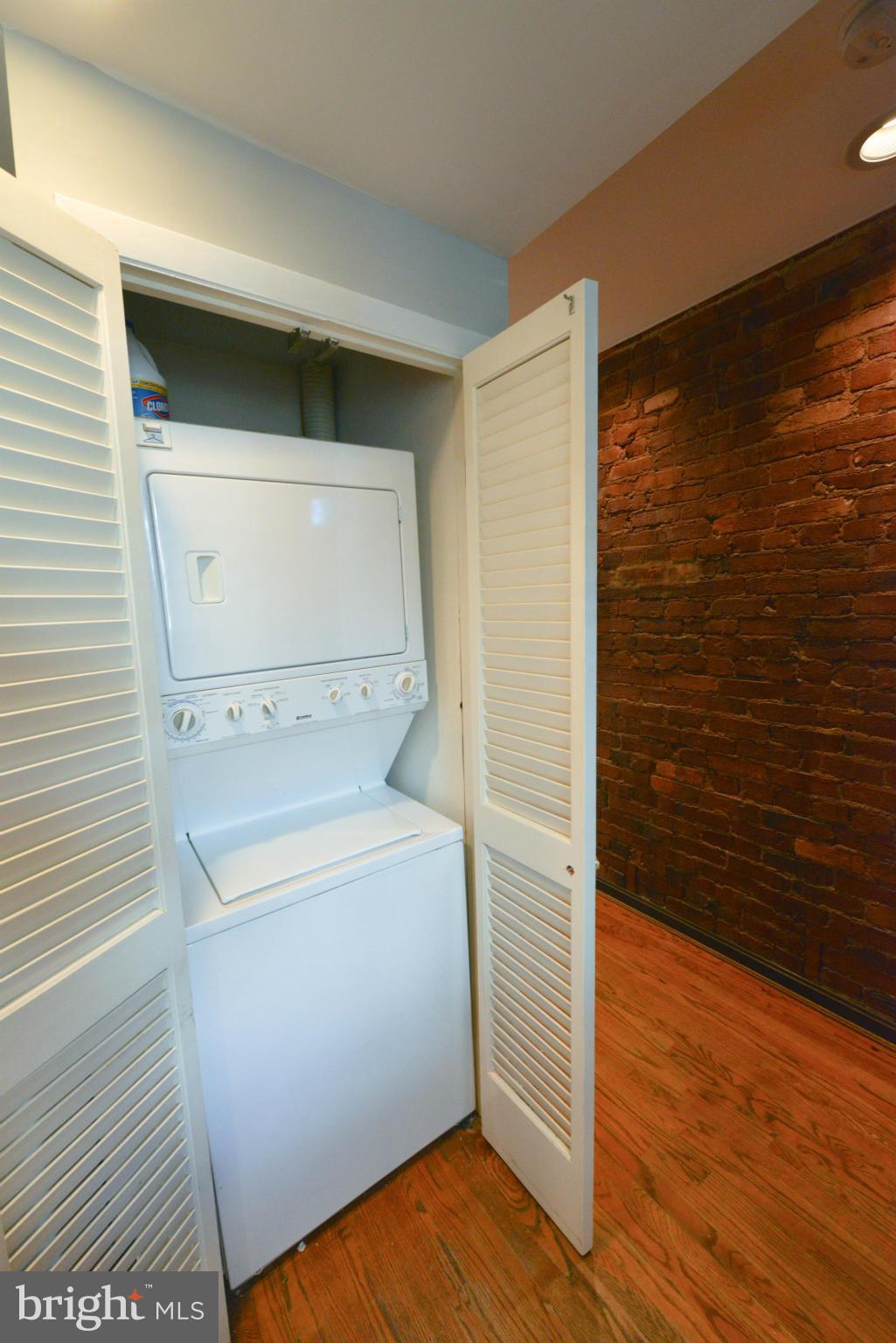 1243 Linden Place Northeast Washington, DC 20002 - Photo 13 of 30 a utility room with wooden floor washer and dryer
