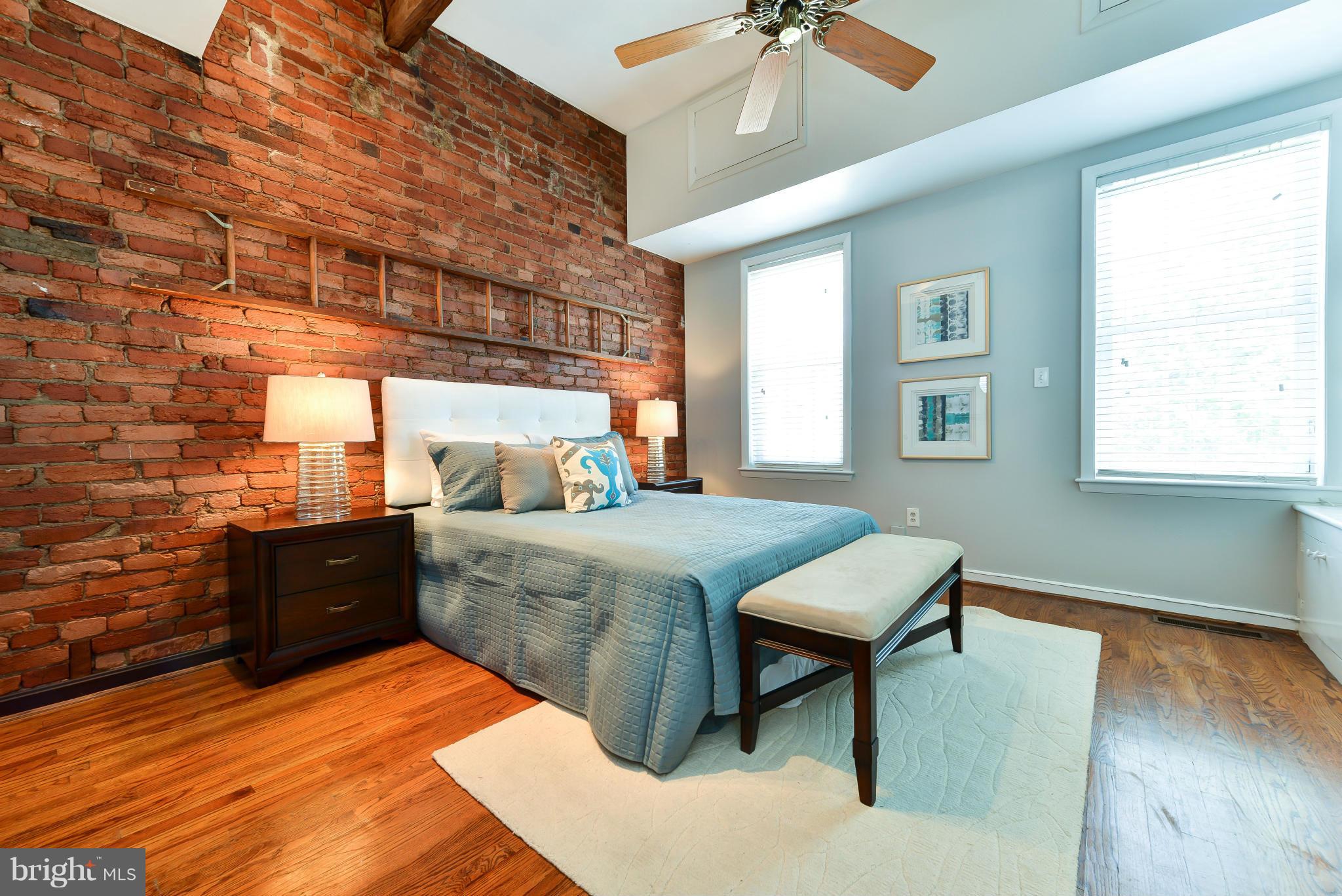1243 Linden Place Northeast Washington, DC 20002 - Photo 16 of 30 a bed room with a bed and a window