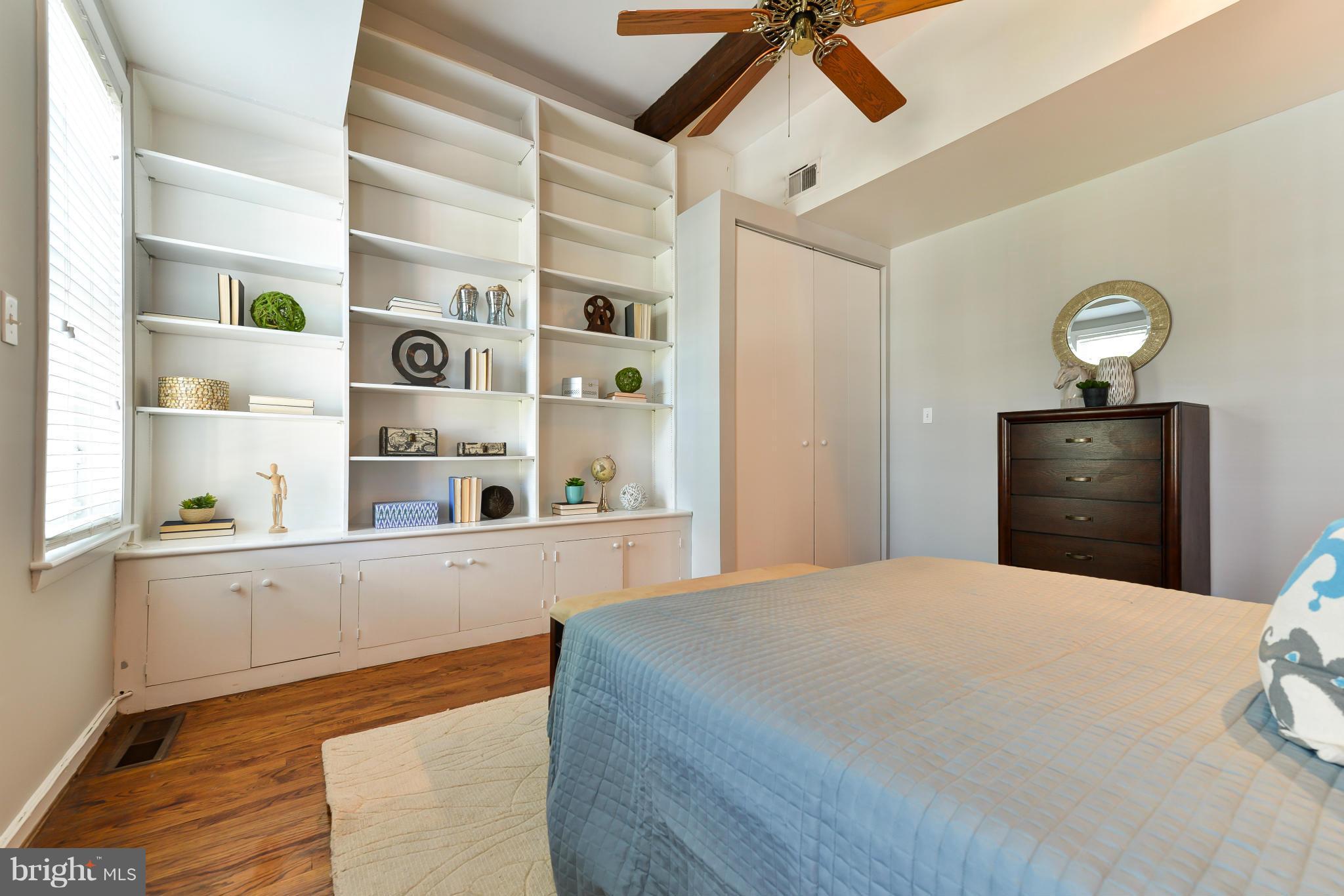 1243 Linden Place Northeast Washington, DC 20002 - Photo 18 of 30 a bedroom with a bed and a window