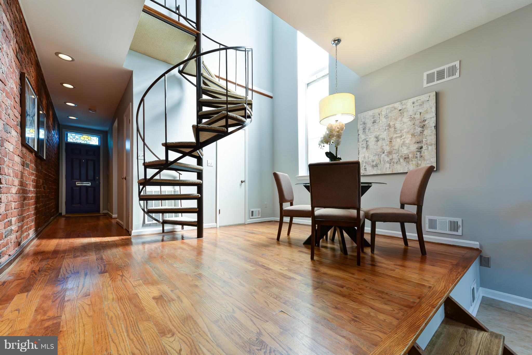 1243 Linden Place Northeast Washington, DC 20002 - Photo 7 of 30 a view of a dining room with furniture and wooden floor
