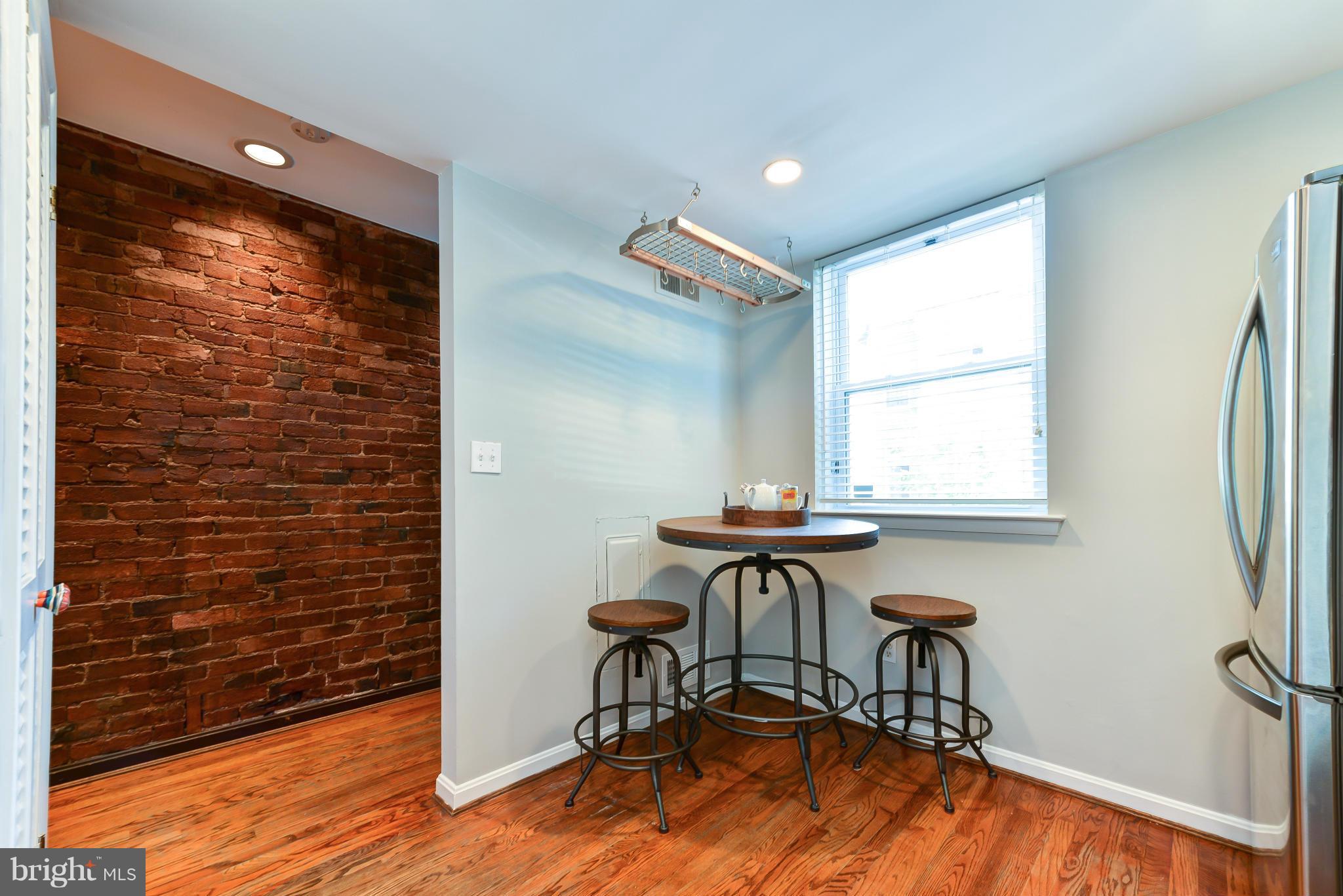 1243 Linden Place Northeast Washington, DC 20002 - Photo 8 of 30 a view of a livingroom with furniture and a window