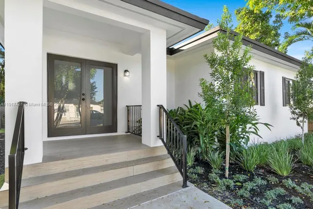 a front view of a house with a porch