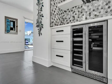 a view of a livingroom with wooden floor