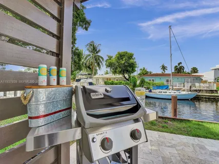 a view of roof deck with patio