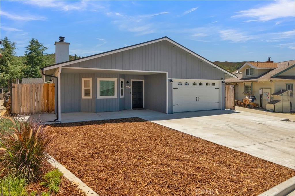 2622 Pinto Lane Paso Robles, CA 93446 - Photo 1 of 22 front view of a house with a yard