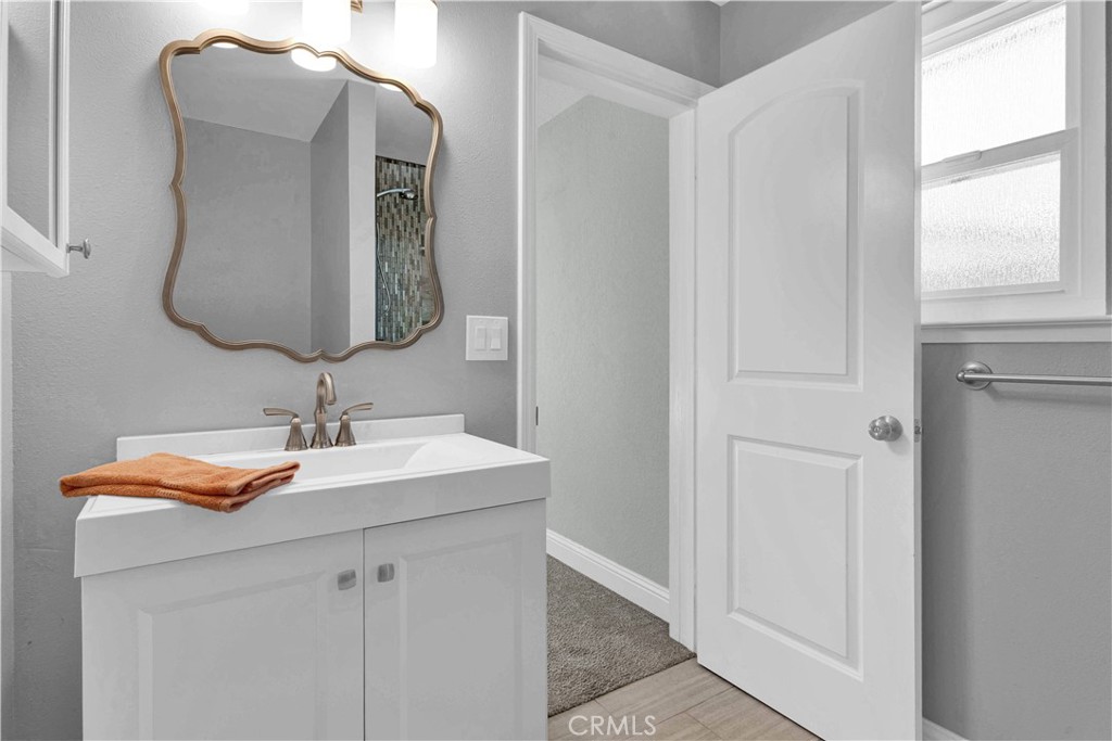 2622 Pinto Lane Paso Robles, CA 93446 - Photo 12 of 22 a bathroom with a sink vanity and mirror