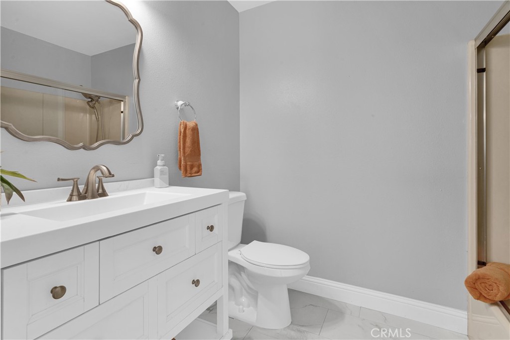 2622 Pinto Lane Paso Robles, CA 93446 - Photo 15 of 22 a bathroom with a sink and a toilet