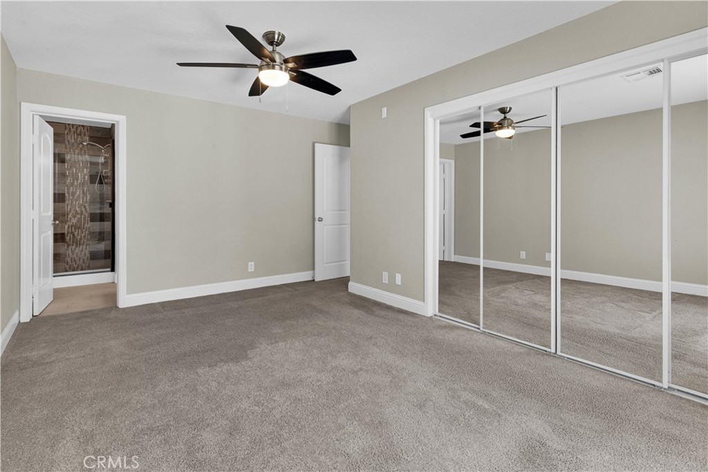 2622 Pinto Lane Paso Robles, CA 93446 - Photo 9 of 22 a view of an empty room with a ceiling fan