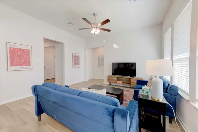 a workspace with furniture and window