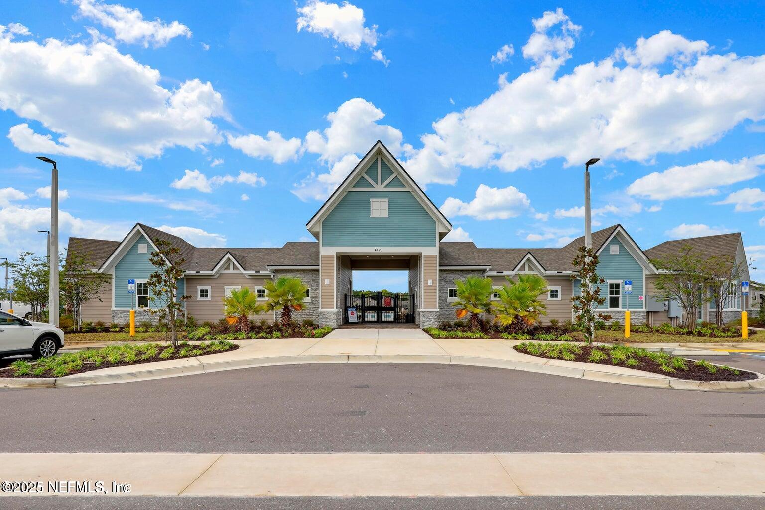 12633 Cacao Tree Trail Jacksonville, FL 32218 - Photo 36 of 44 a front view of a building with trees