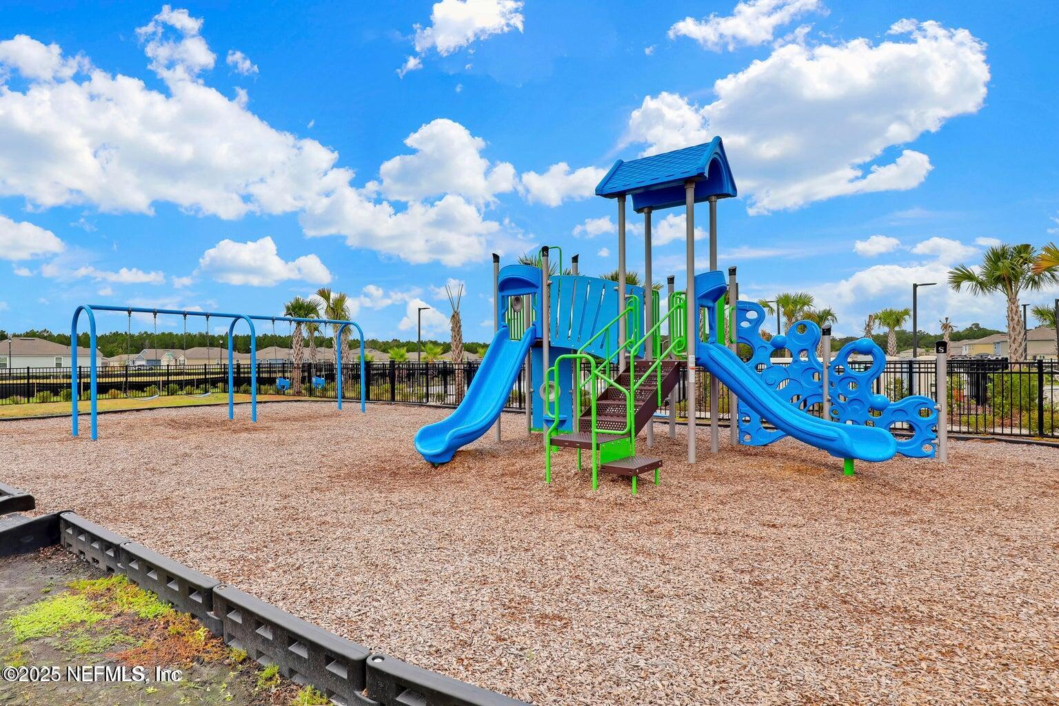 12633 Cacao Tree Trail Jacksonville, FL 32218 - Photo 39 of 44 a view of a park with slide