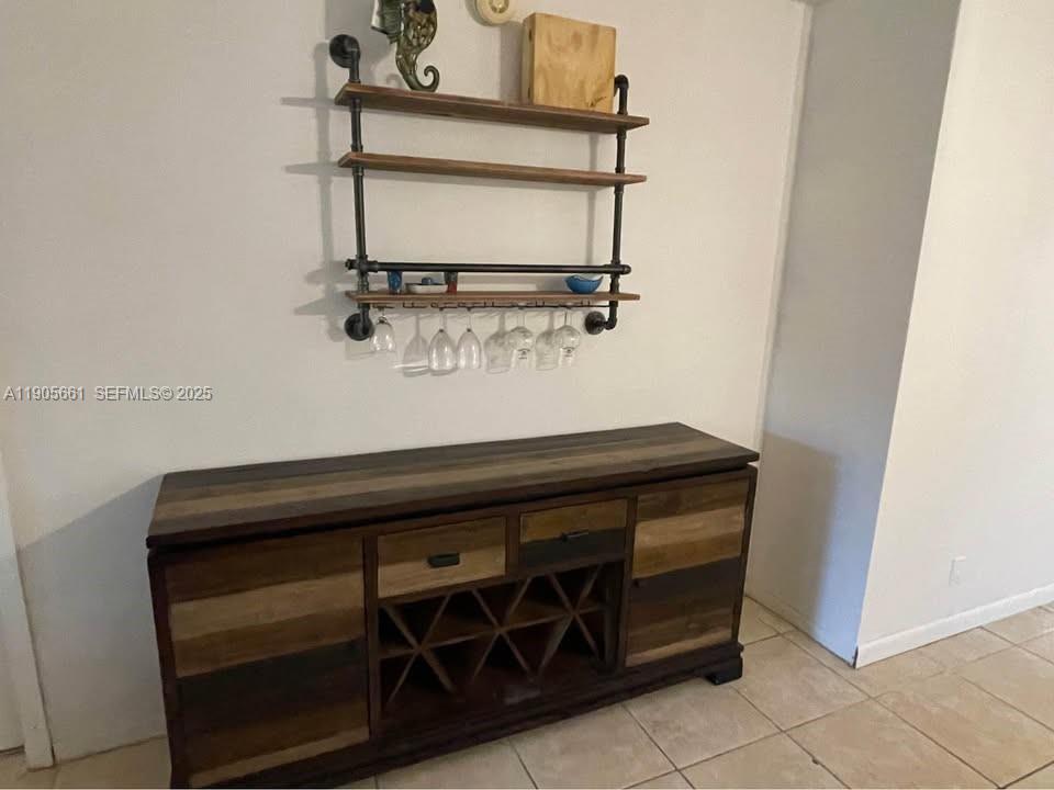 4500 North Federal Highway, Unit 102A Lighthouse Point, FL 33064 - Photo 21 of 37 a close view of shoes