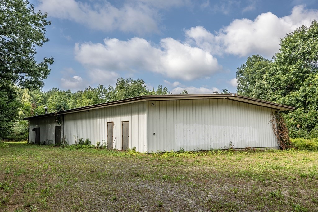 280 Sheldon Road Fitchburg, MA 01420 - Photo 1 of 9 a backyard of a house with lots of green space