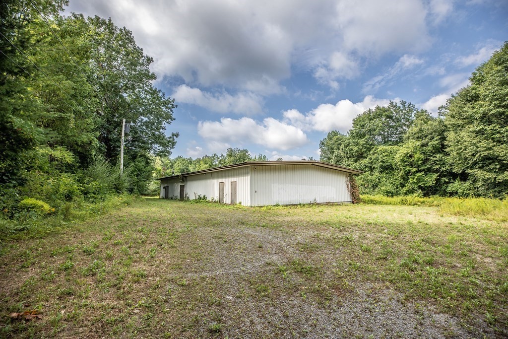 280 Sheldon Road Fitchburg, MA 01420 - Photo 2 of 9 a view of a large garden with plants and large trees