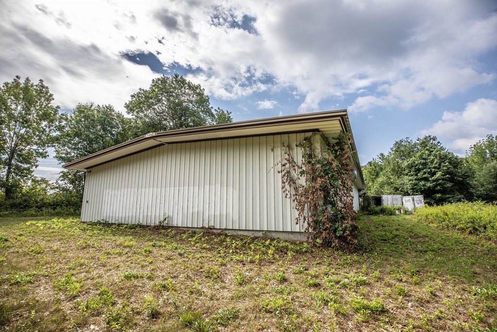 280 Sheldon Road Fitchburg, MA 01420 - Photo 3 of 9 a backyard of a house with lots of green space