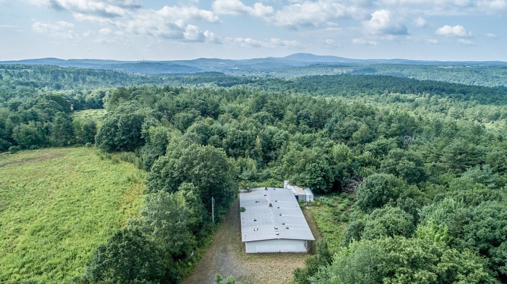280 Sheldon Road Fitchburg, MA 01420 - Photo 5 of 9 an aerial view of a house with mountain view