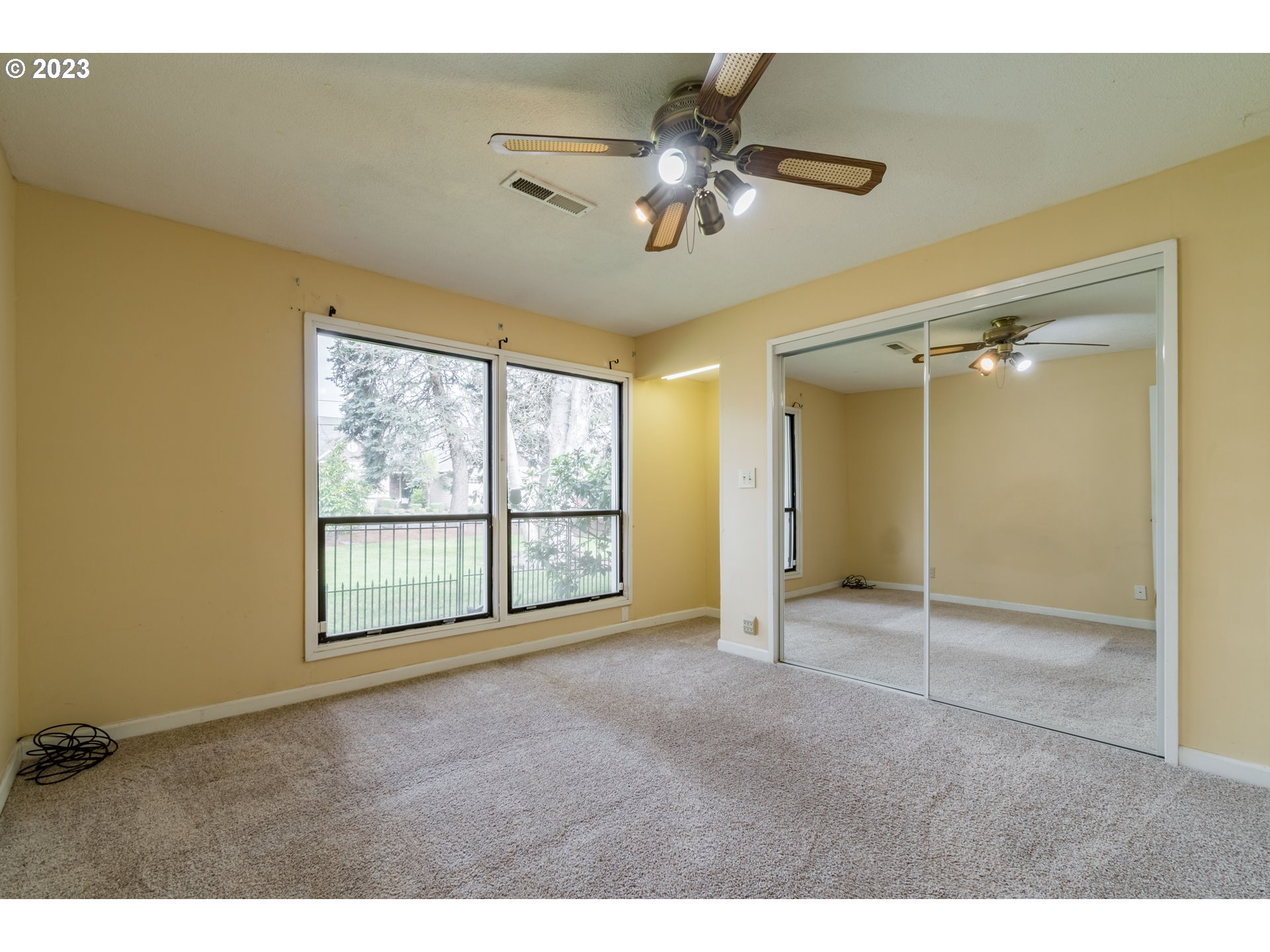 2210 Sandy Drive Eugene, OR 97401 - Photo 19 of 32 a view of an empty room with a window