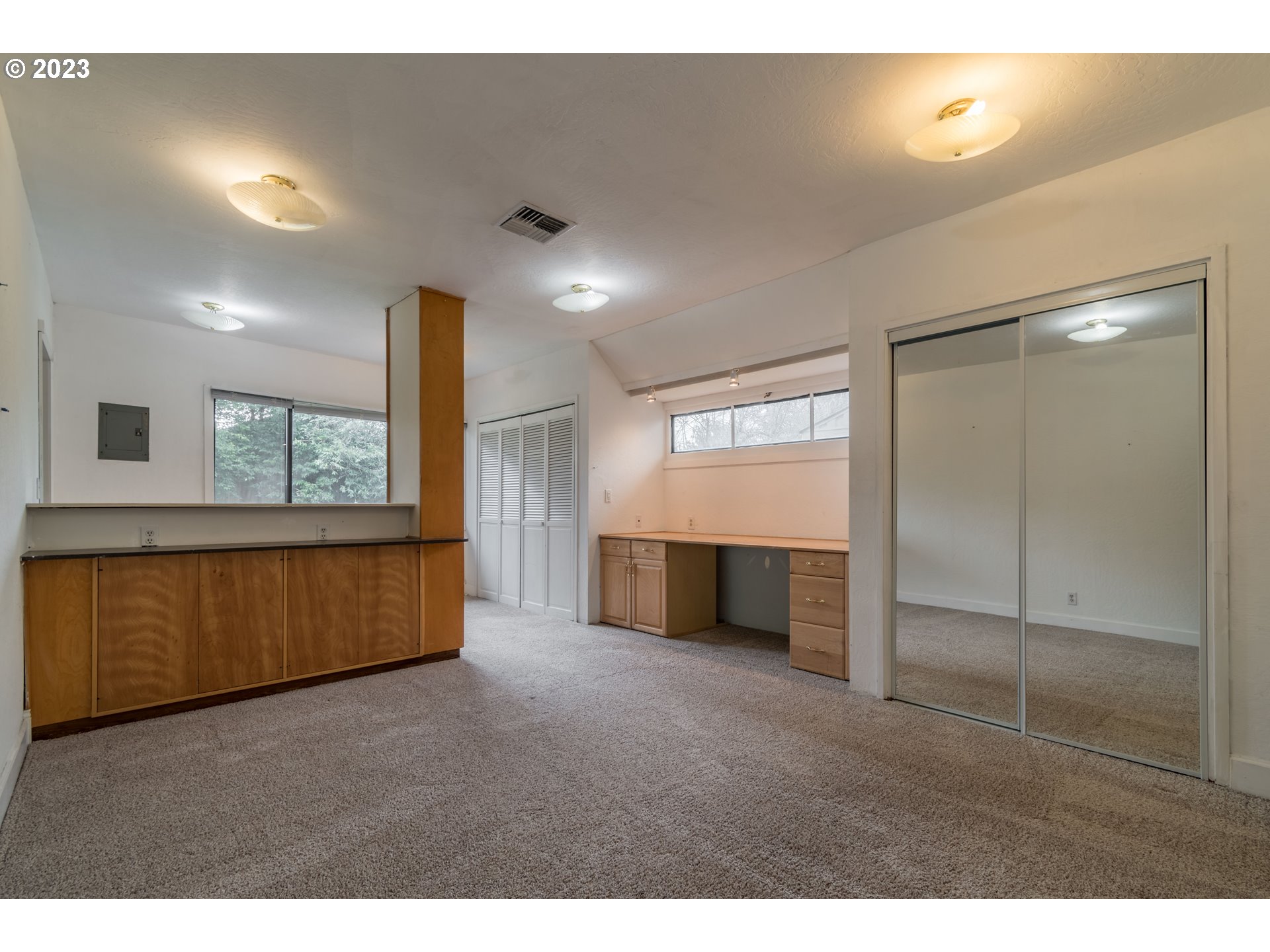 2210 Sandy Drive Eugene, OR 97401 - Photo 23 of 32 a view of an empty room with a window