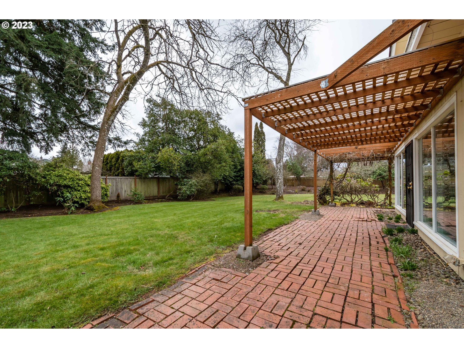 2210 Sandy Drive Eugene, OR 97401 - Photo 29 of 32 a view of a backyard with wooden floor