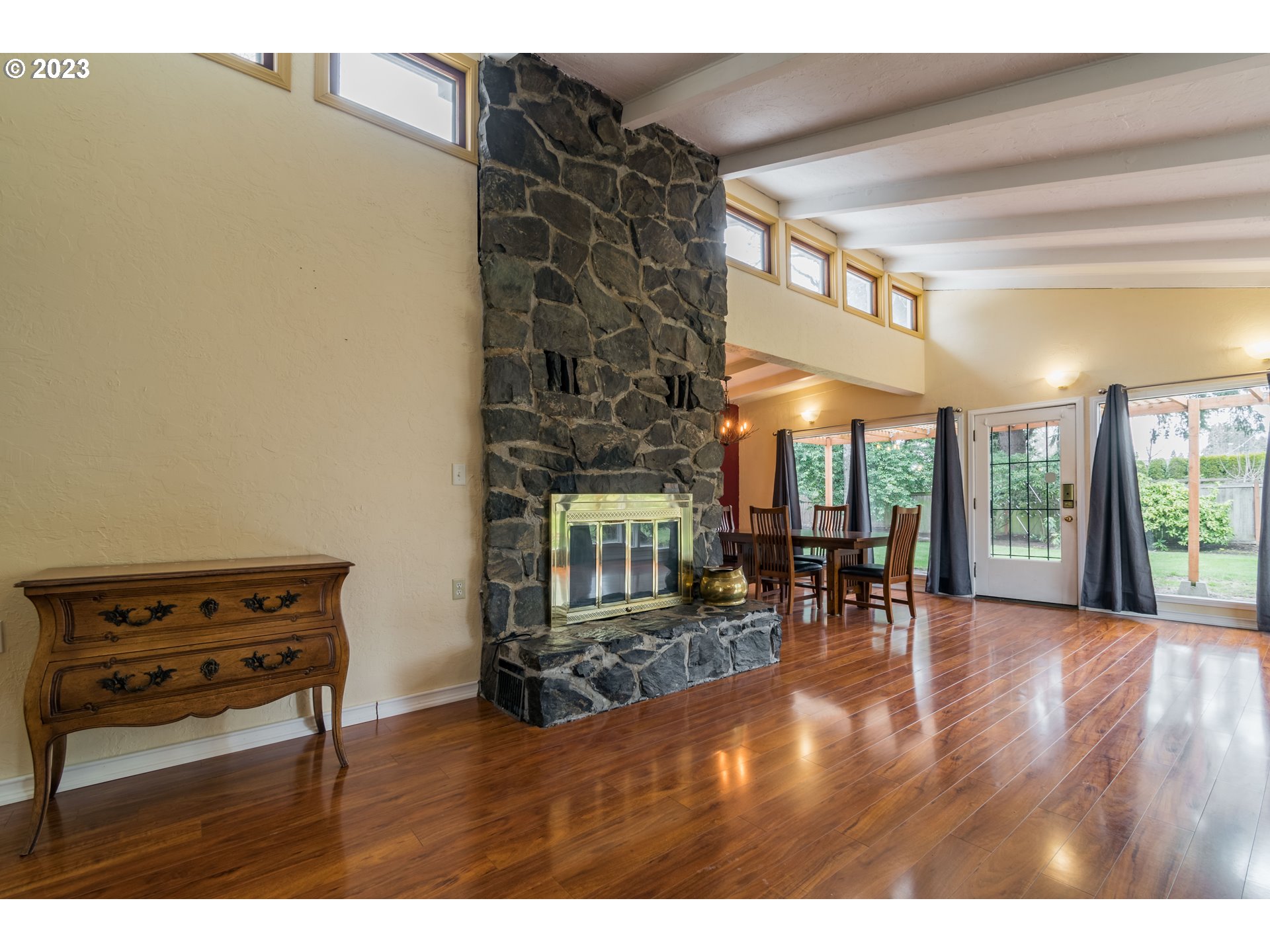 2210 Sandy Drive Eugene, OR 97401 - Photo 5 of 32 a dining room with furniture and wooden floor