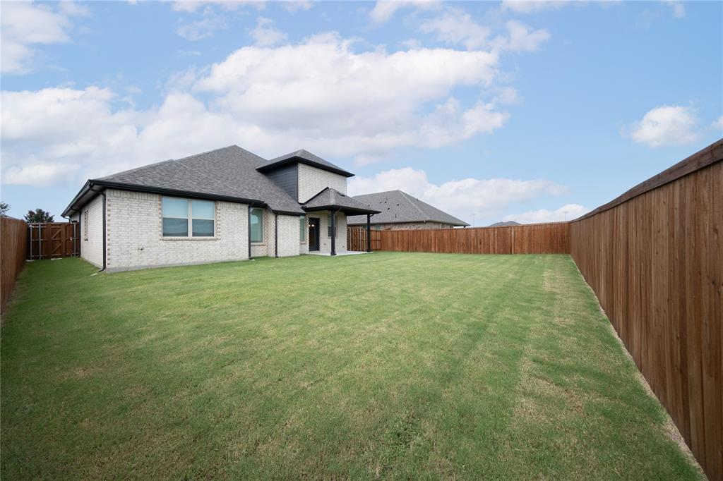 a house view with garden space
