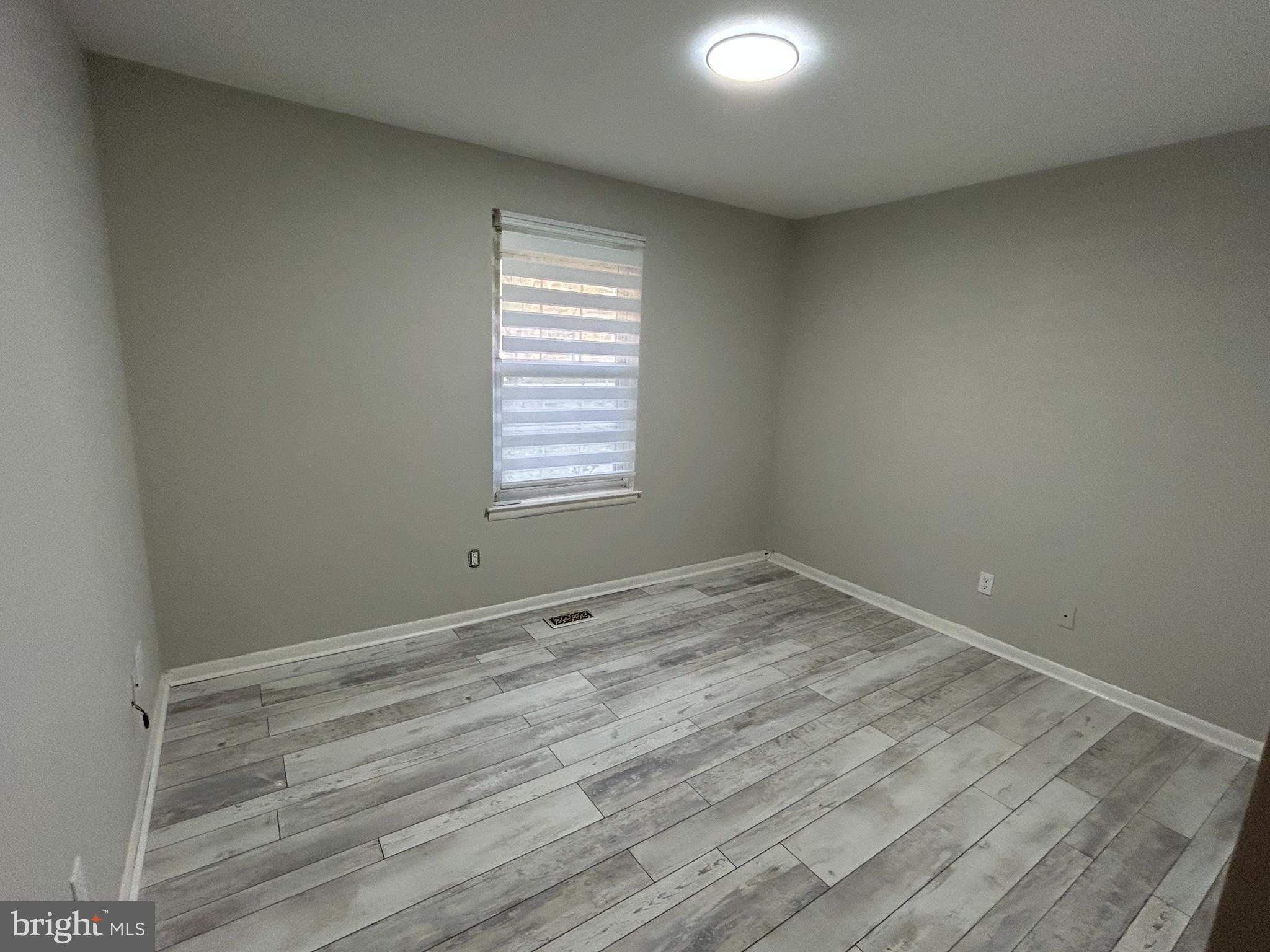 312 Old Forge Crossing, Unit 312 Devon, PA 19333 - Photo 17 of 21 an empty room with a window
