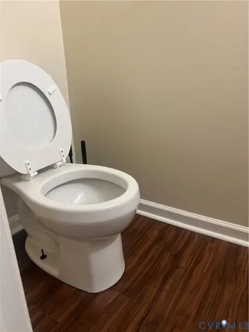a bathroom with a toilet and a sink