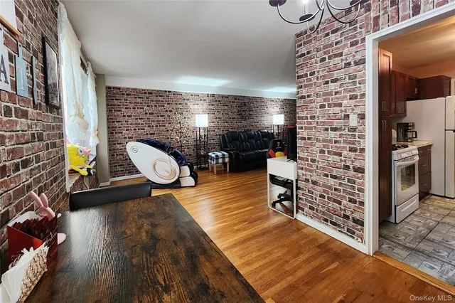 a kitchen with granite countertop a sink and cabinets
