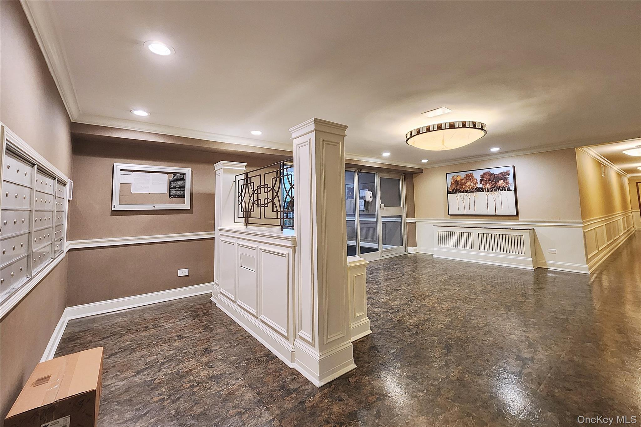 209-20 18th Avenue, Unit 5E Queens, NY 11360 - Photo 23 of 29 a view interior of a house with wooden floor and windows