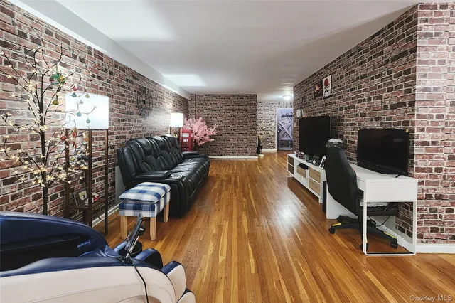 a view of entryway with wooden floor