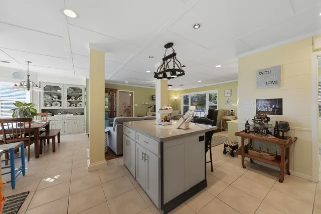 a kitchen with kitchen island granite countertop lots of counter top space
