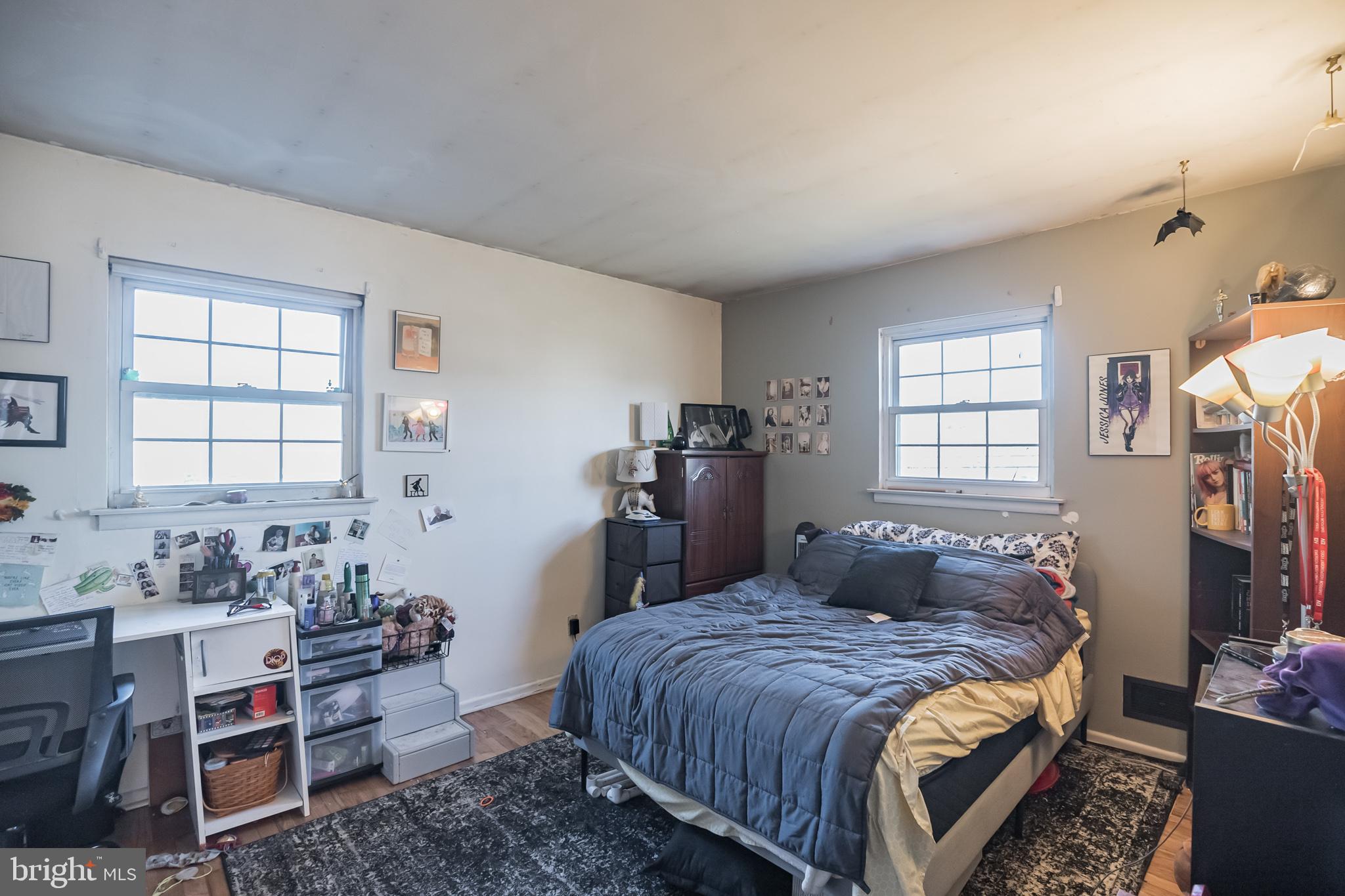 910 Woodlane Road Mount Holly, NJ 08060 - Photo 19 of 27 a bedroom with bed and windows