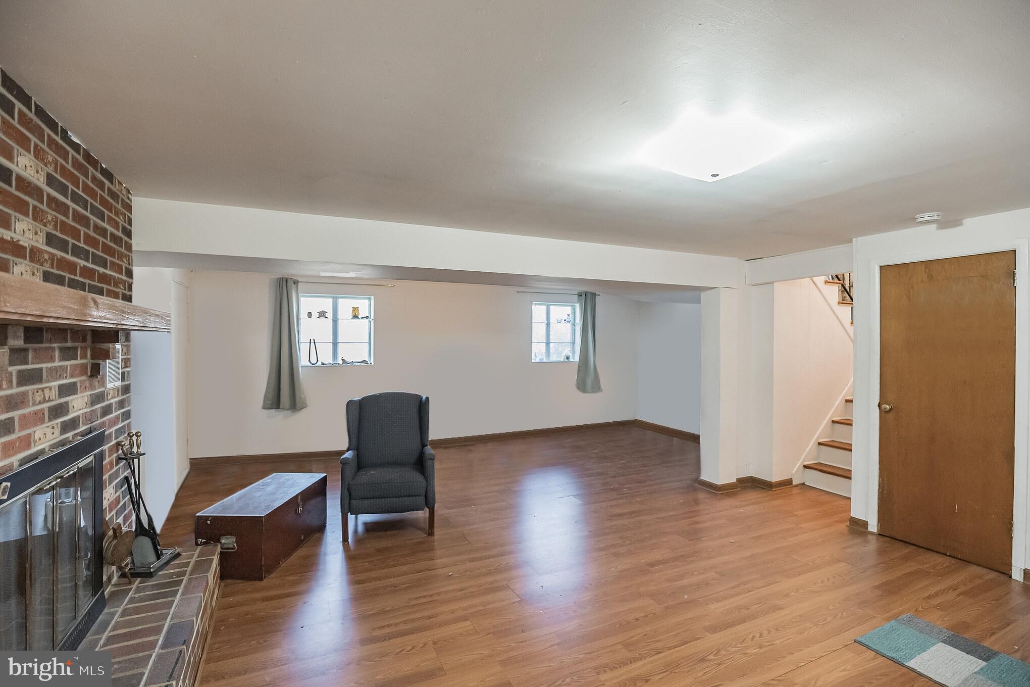 910 Woodlane Road Mount Holly, NJ 08060 - Photo 22 of 27 a living room with furniture and a window