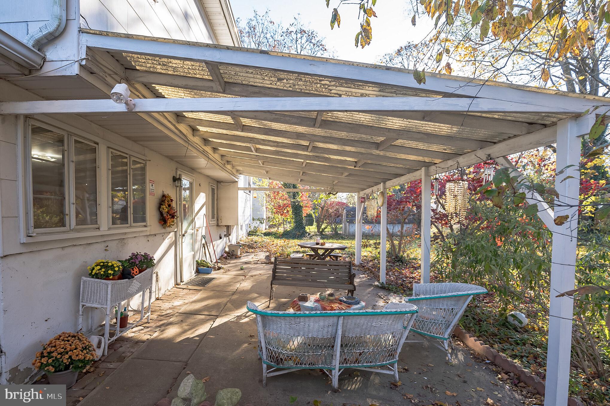 910 Woodlane Road Mount Holly, NJ 08060 - Photo 27 of 27 a view of a chairs and tables in a patio