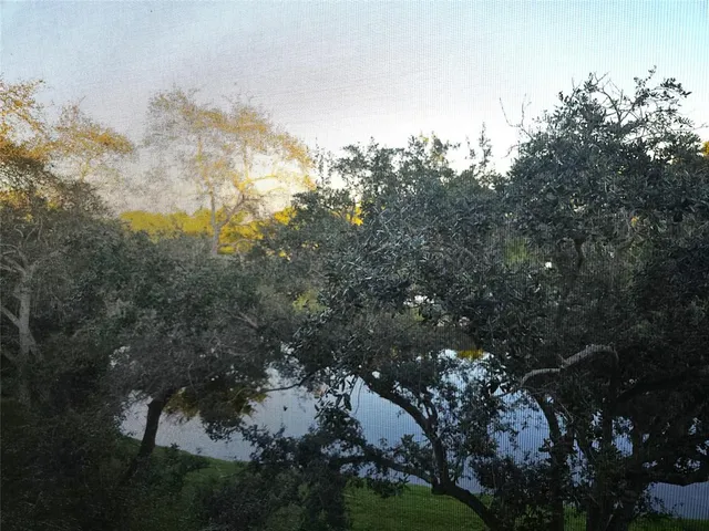 a view of a balcony filled with furniture