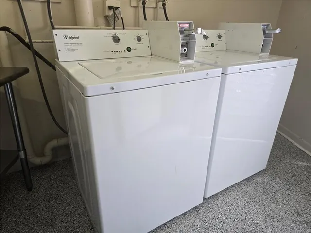 a view of a lake with houses in the back