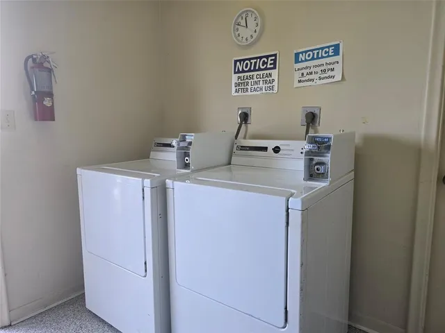an aerial view of a swimming pool a playground and lake view