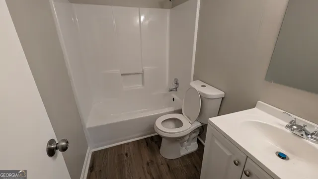 a bathroom with a sink and a toilet