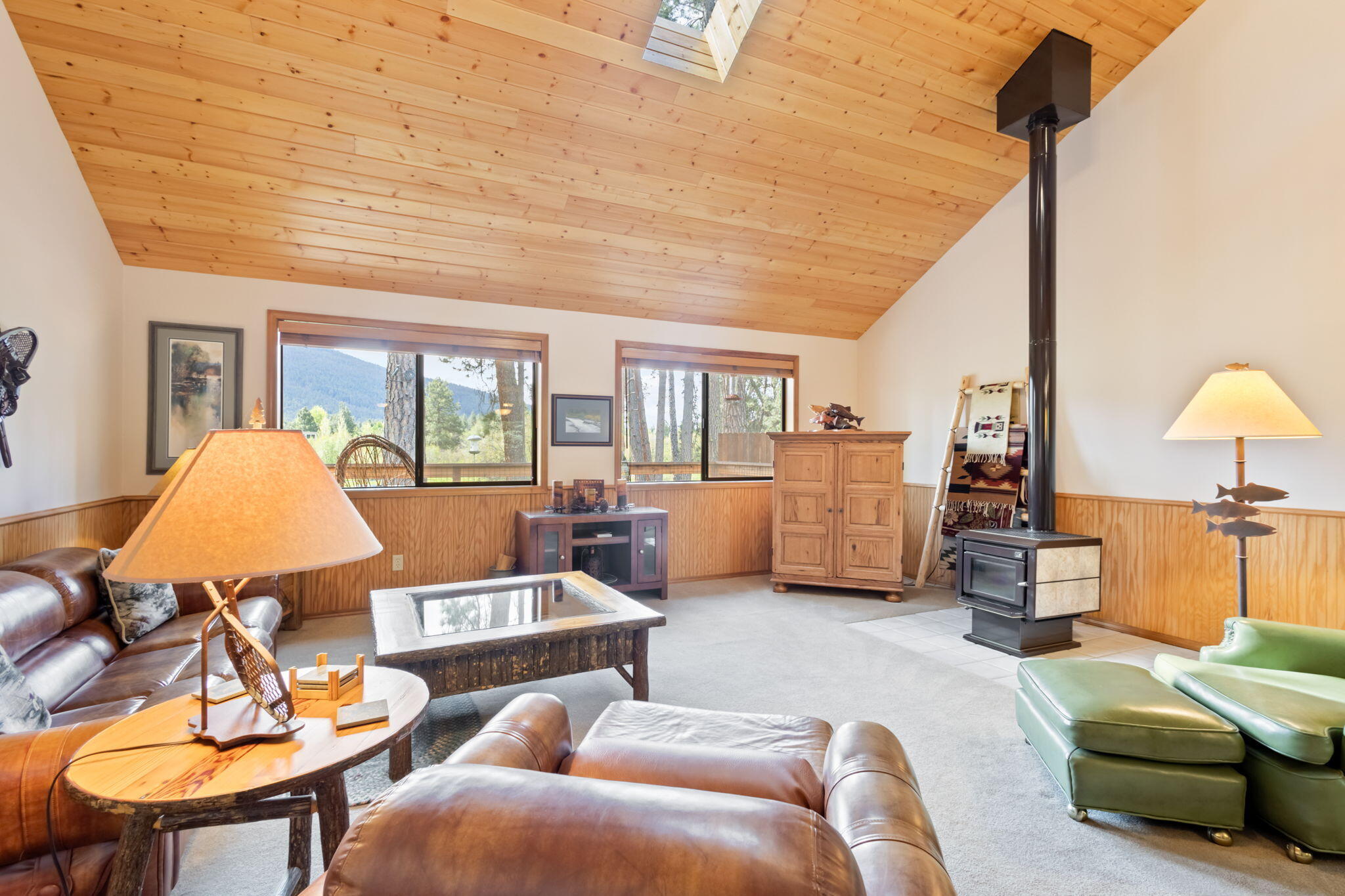 26223 Southwest Pine Lodge Road Camp Sherman, OR 97730 - Photo 16 of 60 Kent Tile wood stove, skylight and ceiling fan