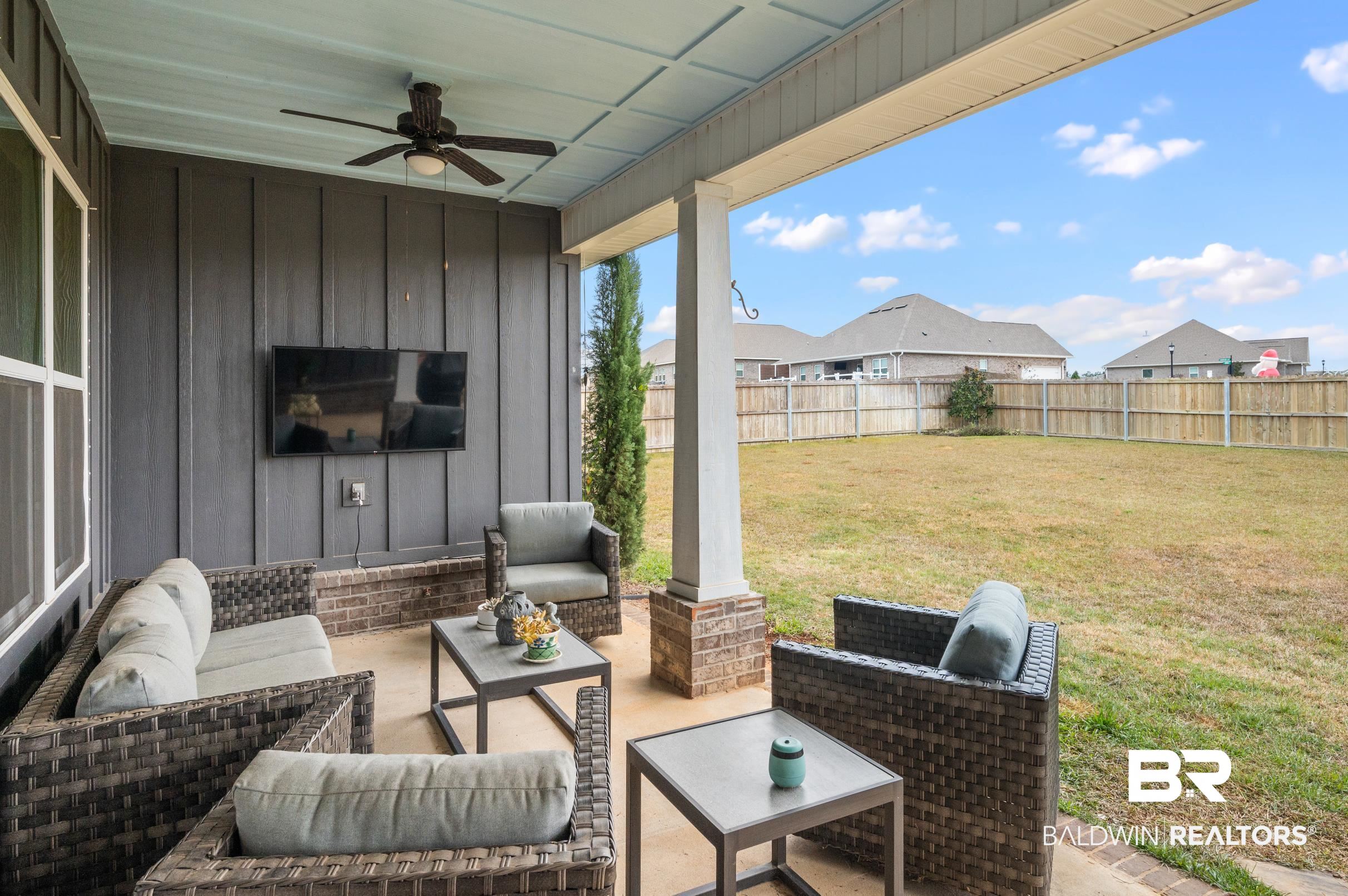 31355 Limpkin Street Daphne, AL 36527 - Photo 45 of 57 View of patio with outdoor lounge area and ceiling fan