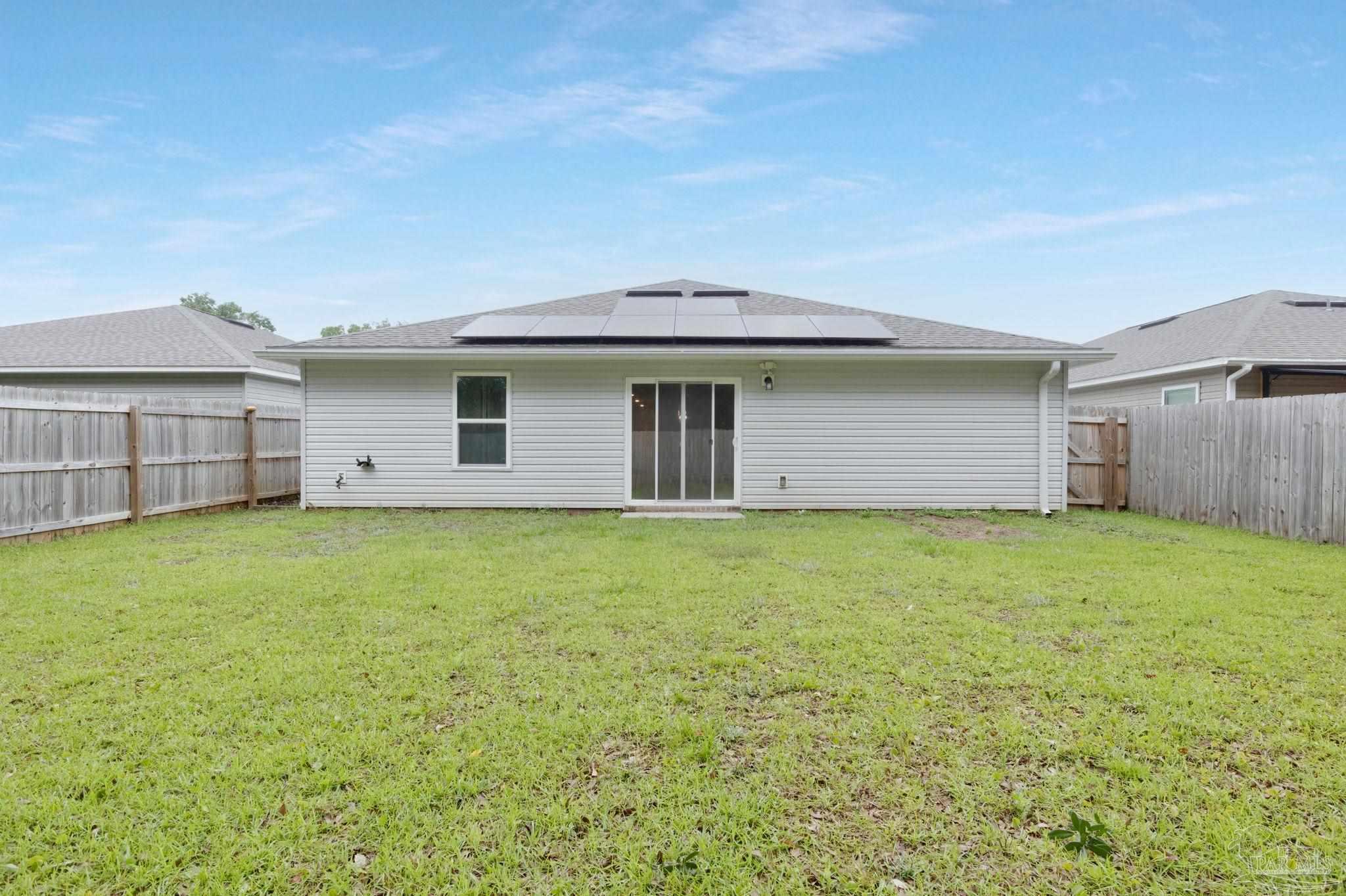 1625 Addies Way Pensacola, FL 32534 - Photo 6 of 50 a backyard of a house with lots of green space