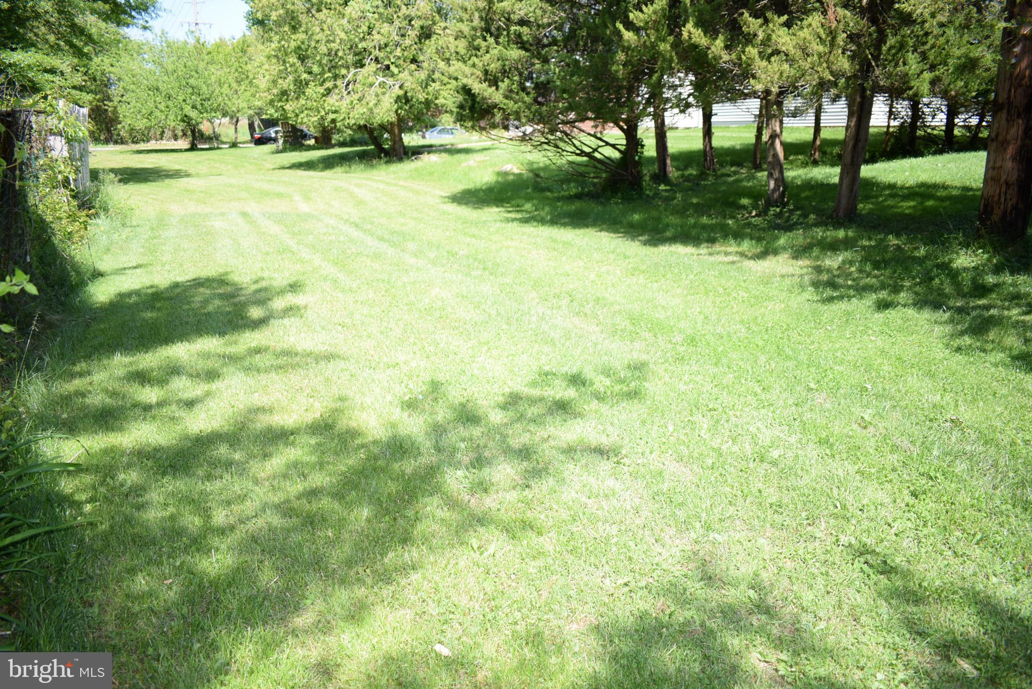69 Allison Road Hightstown, NJ 08520 - Photo 34 of 34 Additional yard beyond tree line