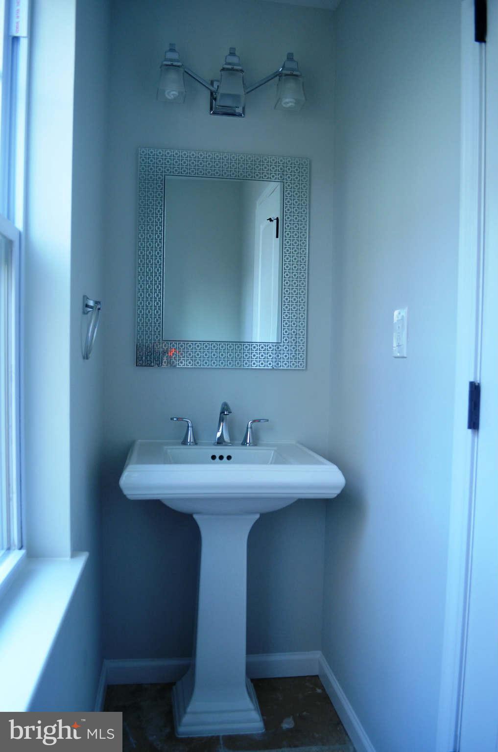 9931 Woodburn Road Silver Spring, MD 20901 - Photo 11 of 27 1st Floor Powder Room
