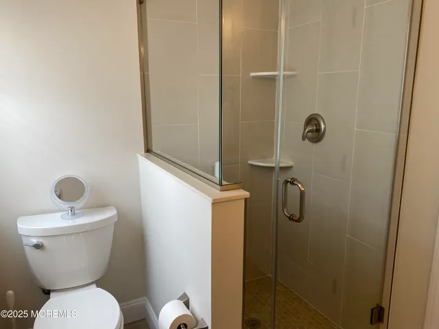 a bathroom with a toilet and sink