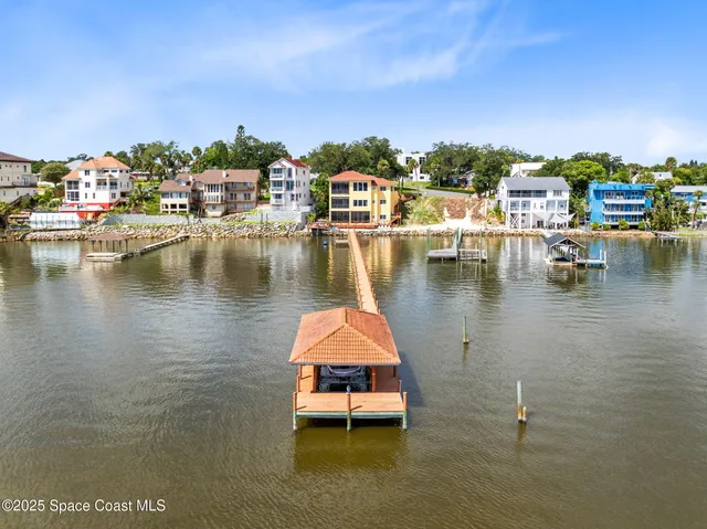 a swimming pool view with a lake view